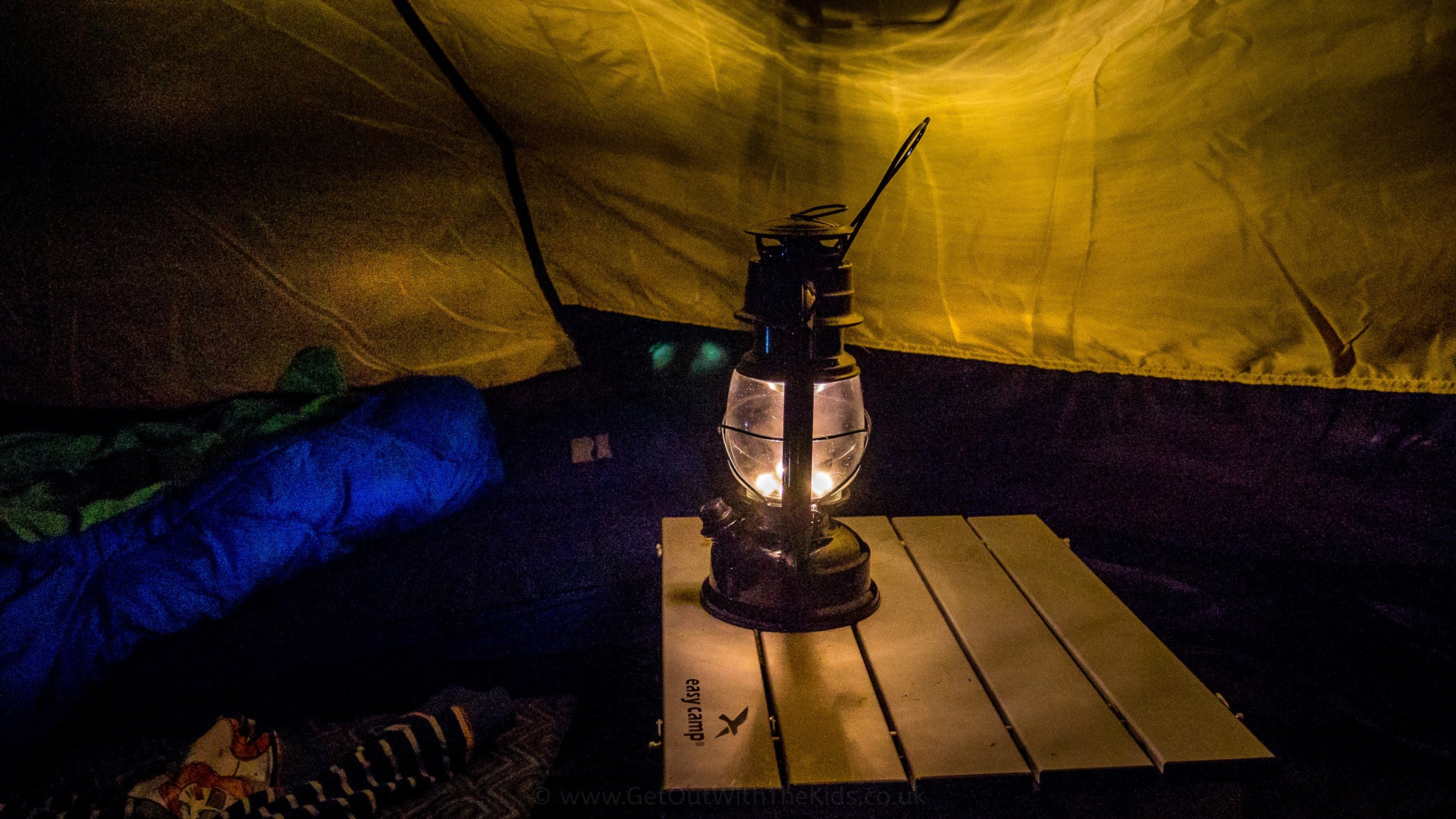 Photo of electric lantern in a tent.