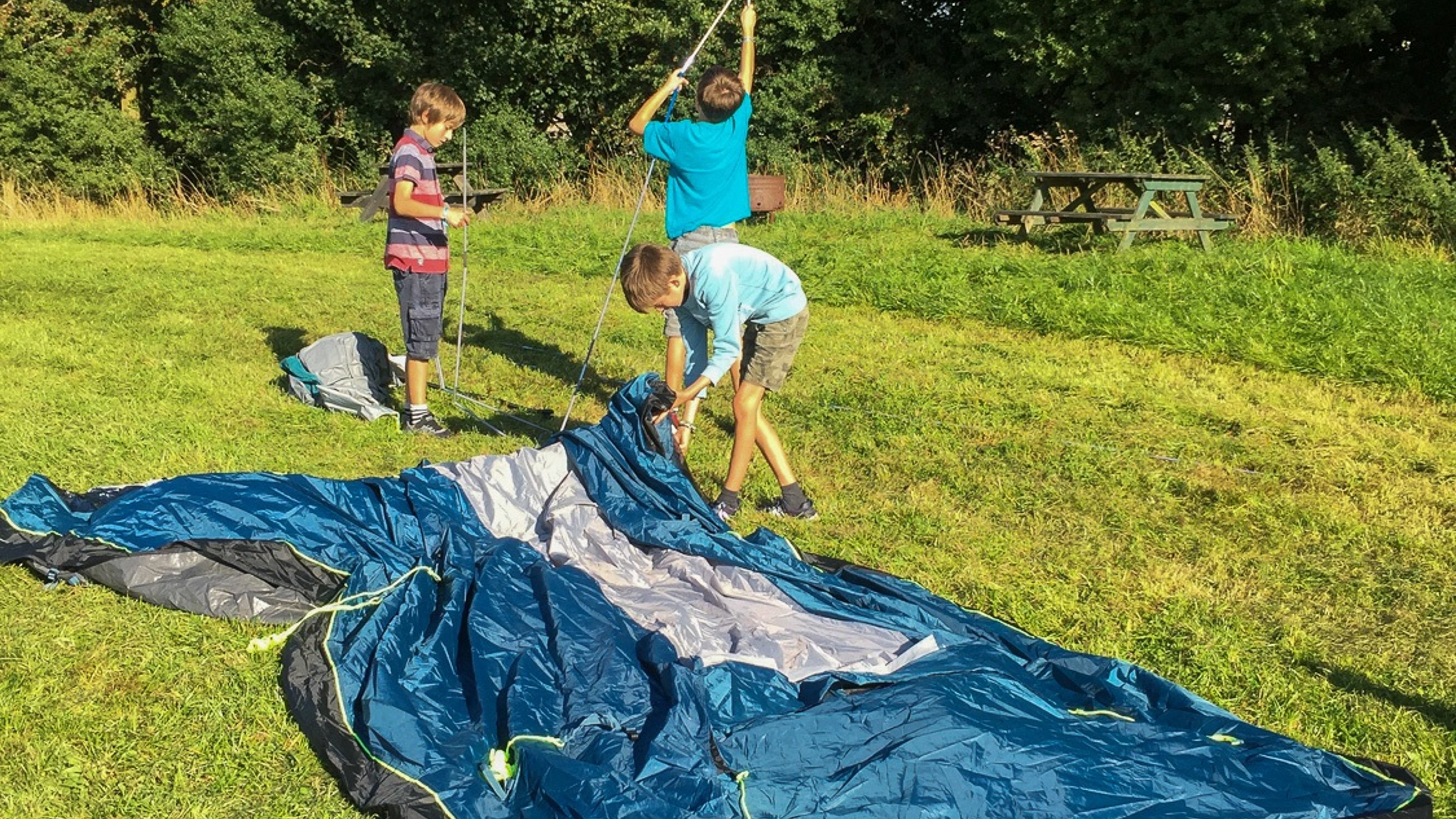 The kids setting up their tent