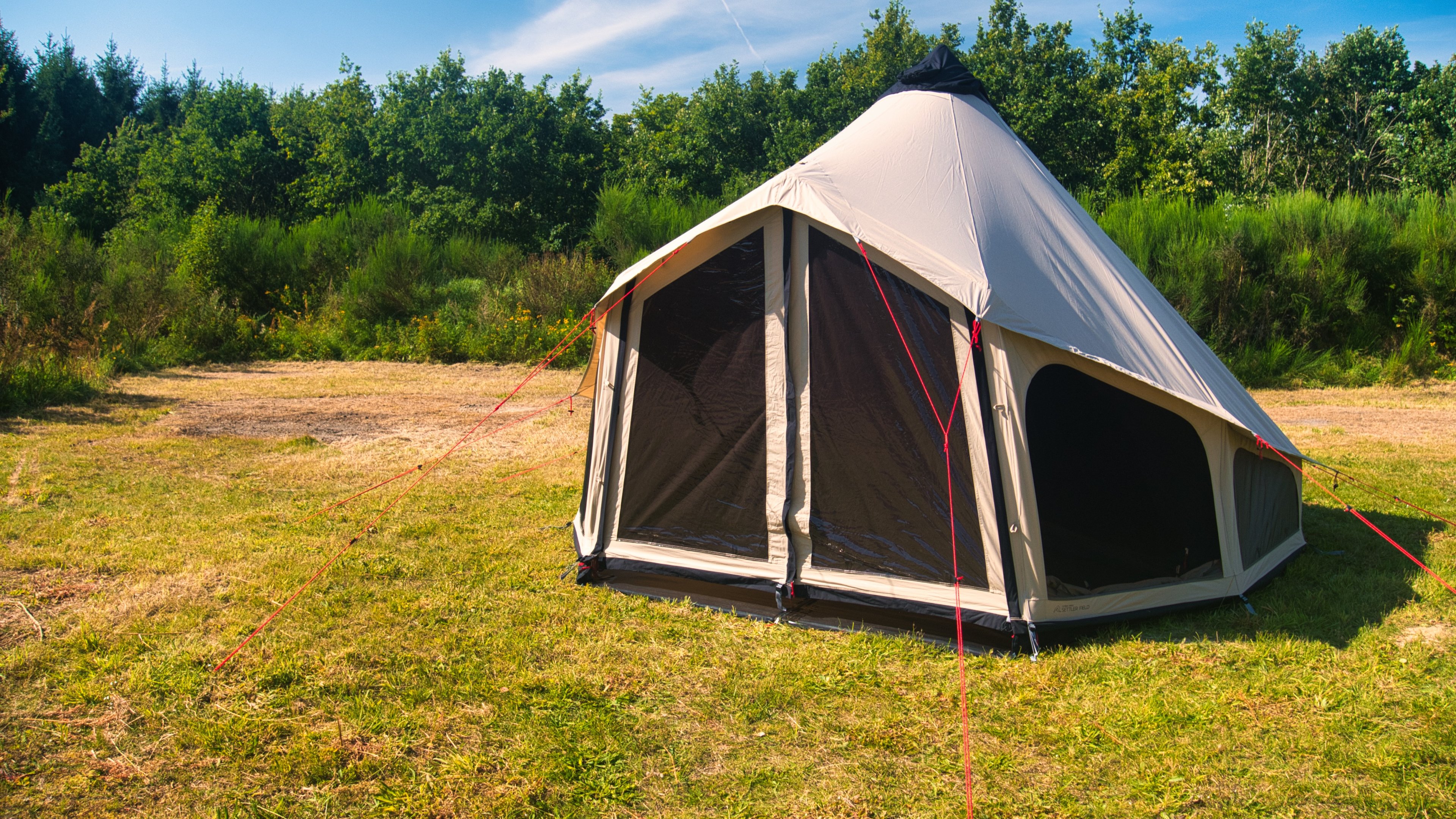 The Robens Settler Field tent pitched in a field