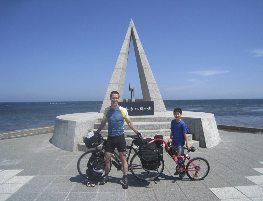 Charles R. Scott with son Sho and their bikes