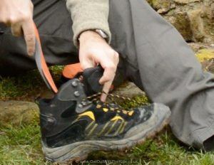 Fitting insole into walking boots
