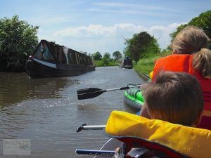 Letting canal traffic pass by our little inflatable canoes