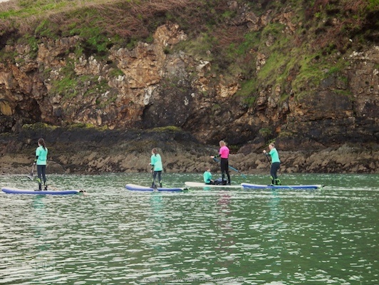  Stand-up Paddle Boarding with Board Games Surfing in Fishguard