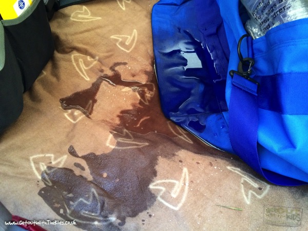 Puddle caused by bags left against the tent walls