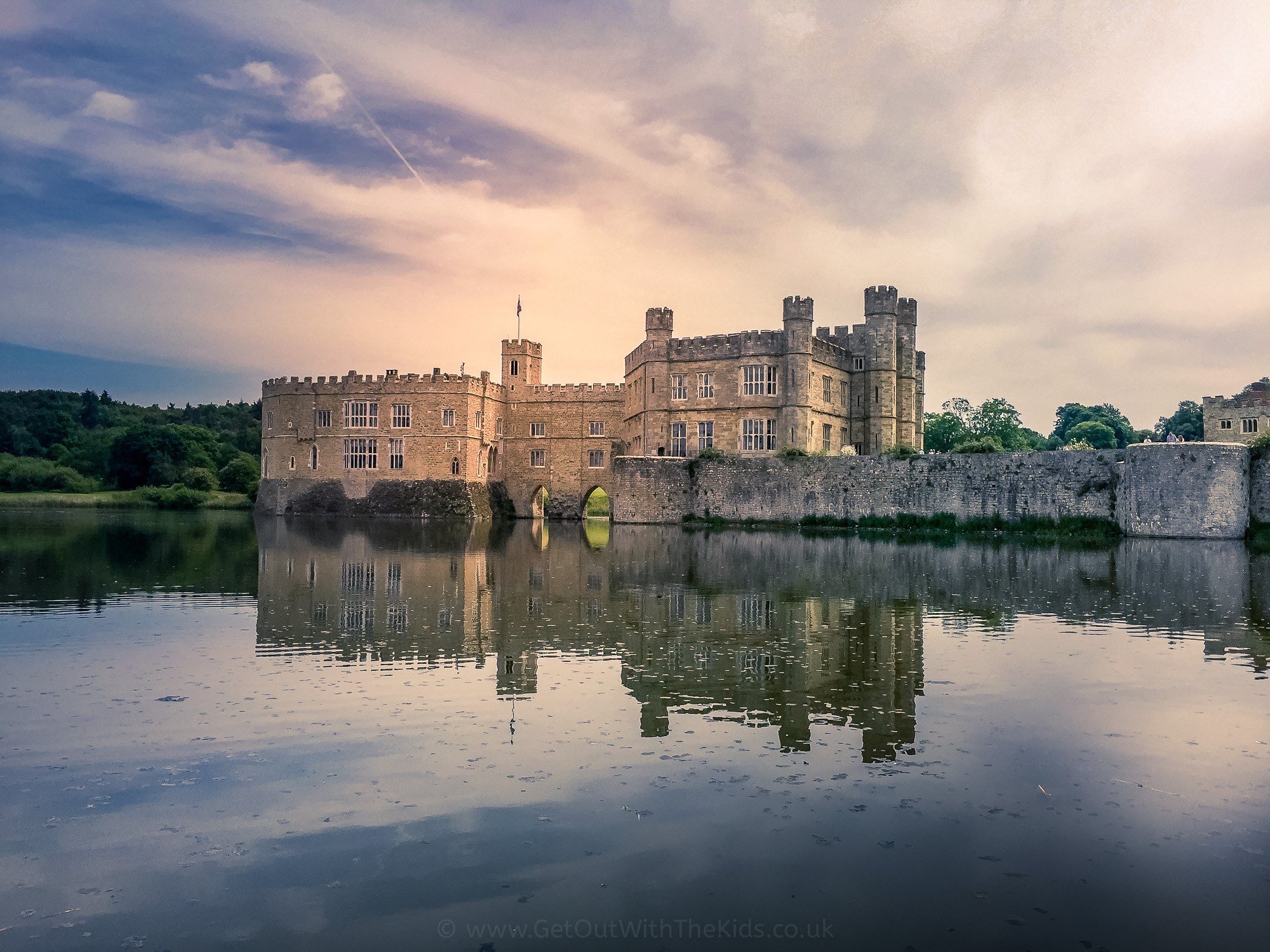  Leeds castle is surrounded by a massive moat.