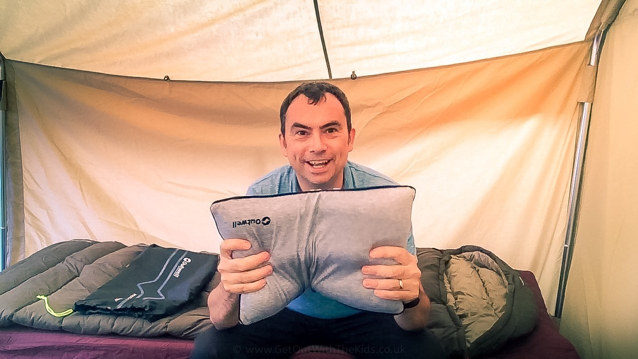 Me holding the Outwell Memory Pillow in my tent