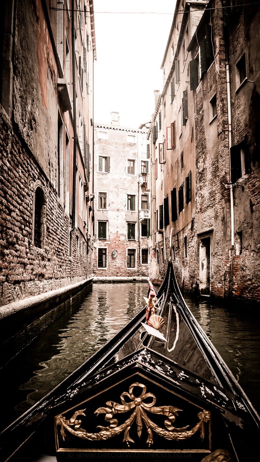 A gondola on a narrow canal