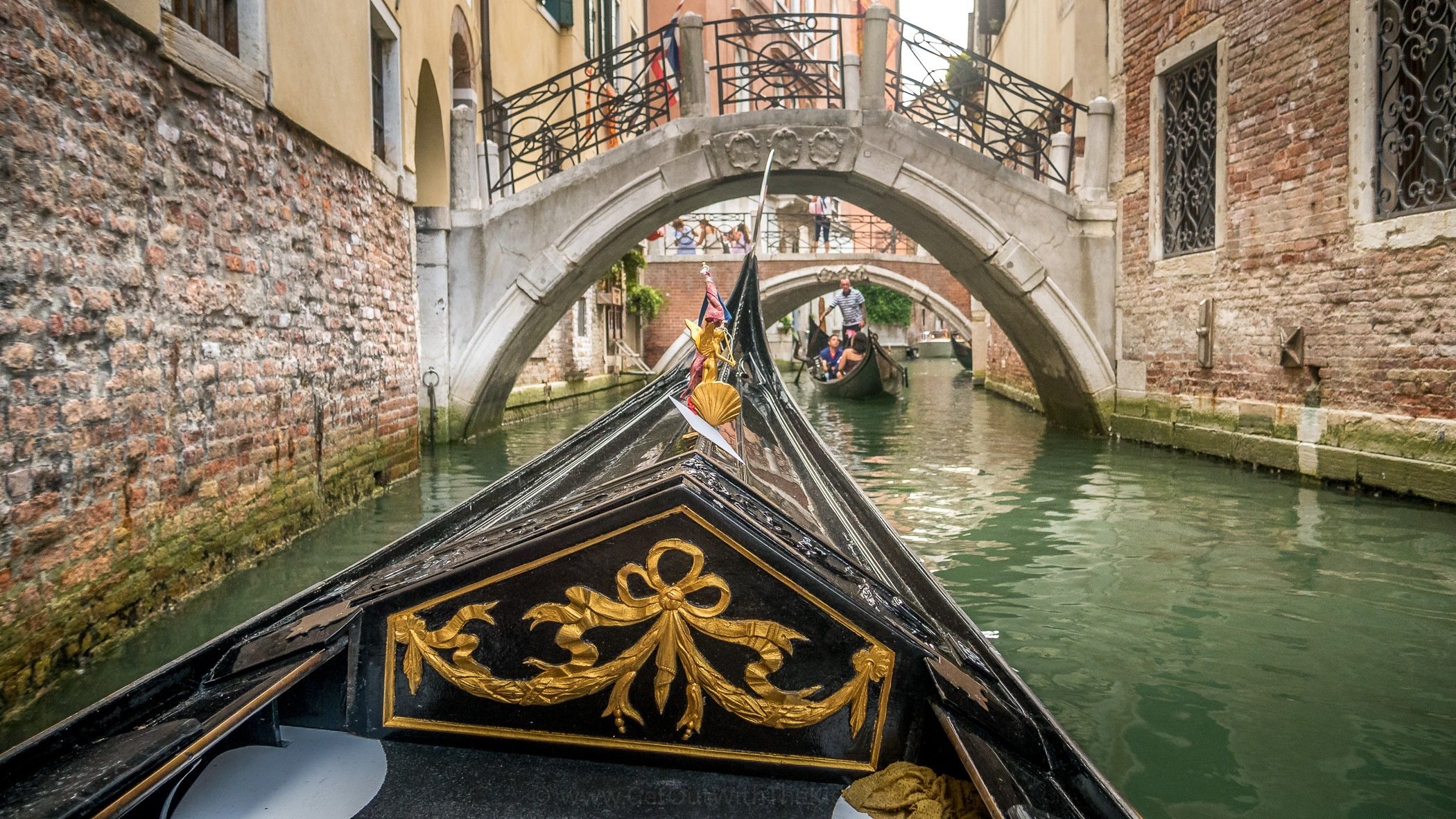 A gondola ride under bridges in Venice