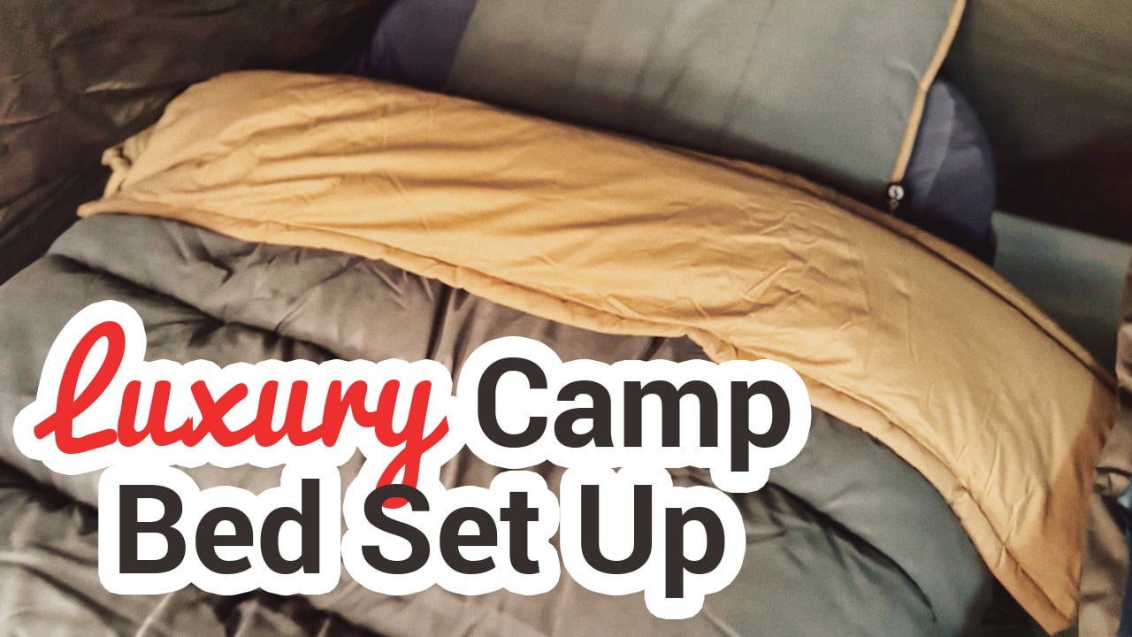 A camp bed using the Outwell Constellation Duvet and Pillow