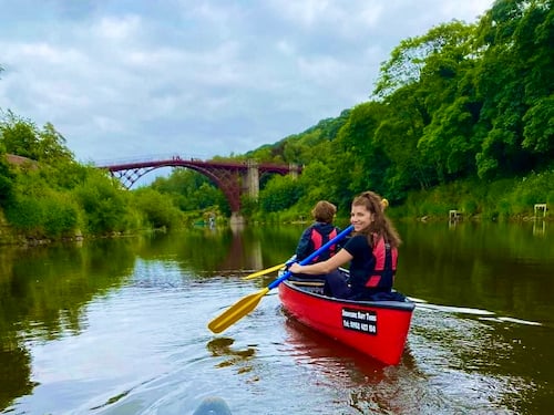 Canoeing under the Iron Bridge in Shropshire