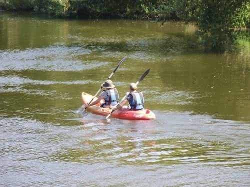 People on a tandem sit-on-top kayak