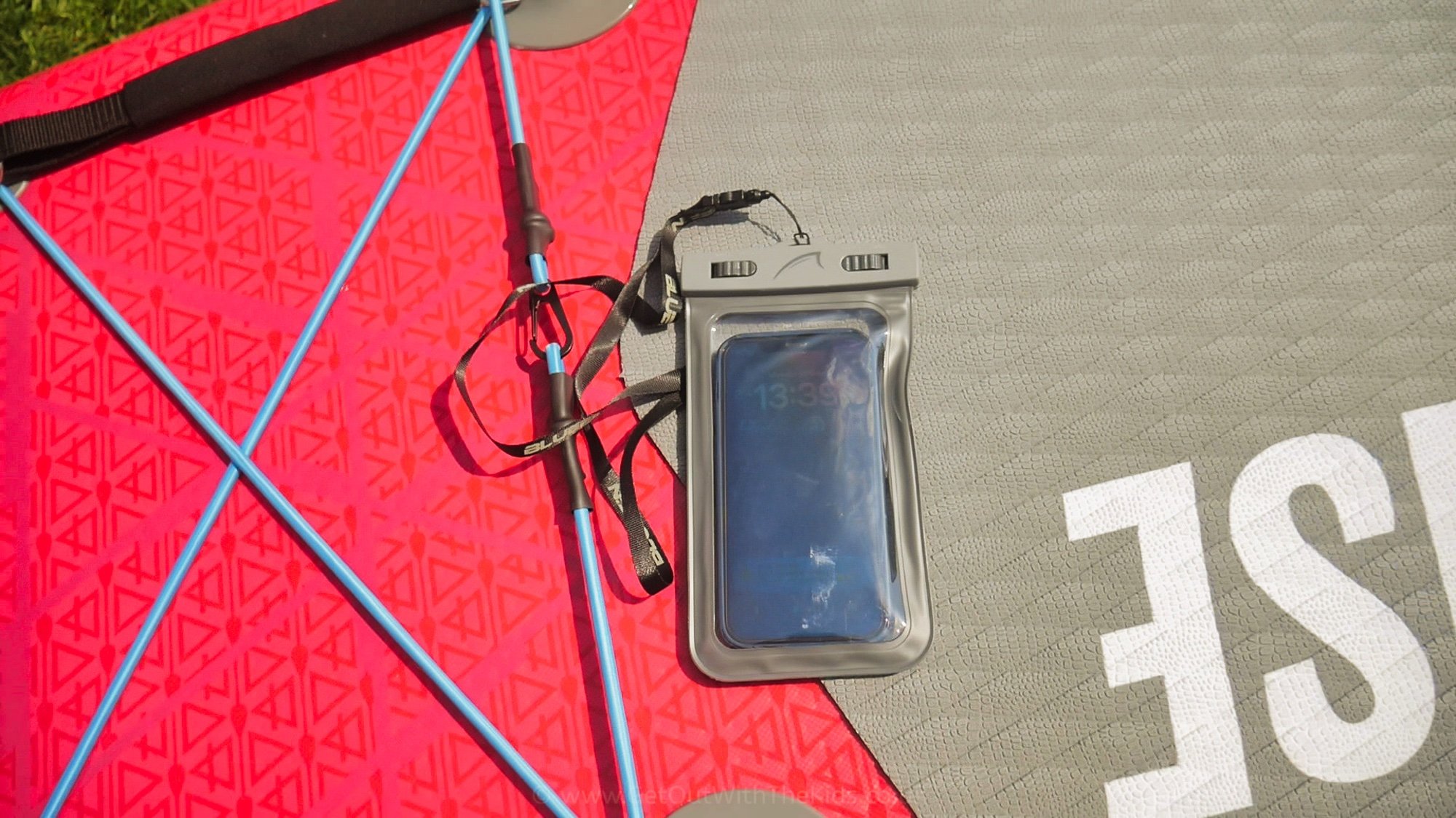A phone in the supplied dry bag
